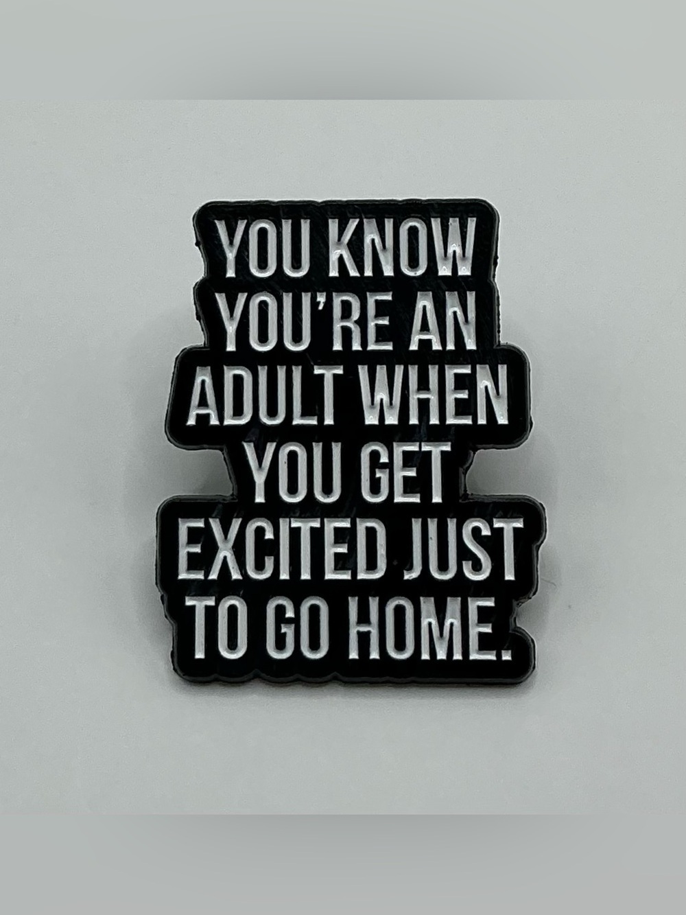 ENAMEL LAPEL PIN EXCITED TO GO HOME